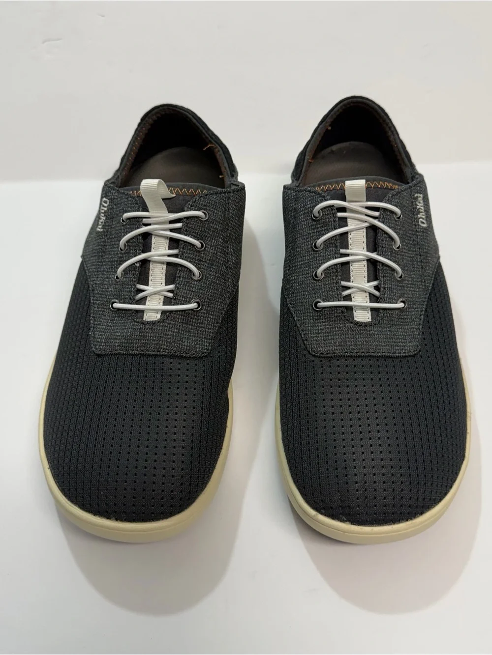 OluKai Men's Black and Cream Casual Perforated Slip-On Sneakers